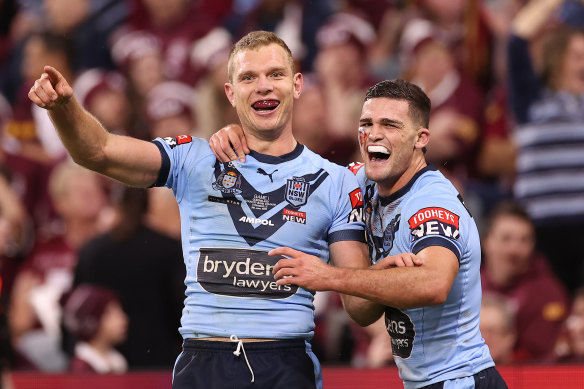 Tom Trbojevic and Nathan Cleary celebrate a try.