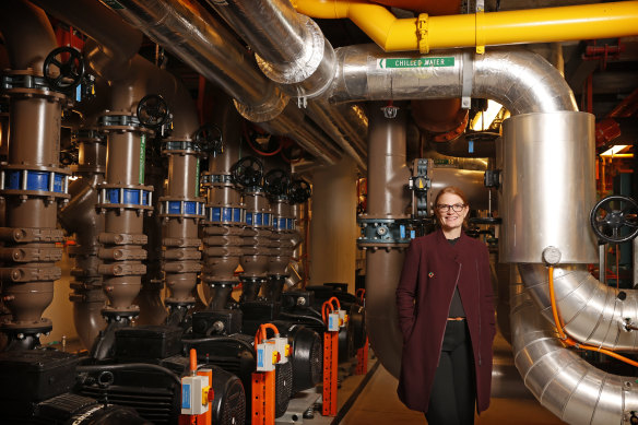 Sydney Opera House Environmental Sustainability Manager Emma Bombonato, with some of the 35 kilometres of pipes that heat and cool the building.