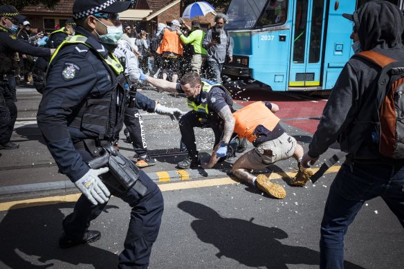 Protesters clashed with police during a violent anti-lockdown rally in Melbourne’s inner east on September 18.