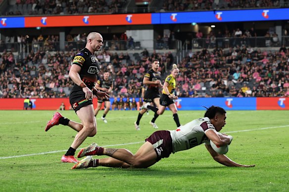 Tolutau Koula scores for the Sea Eagles.