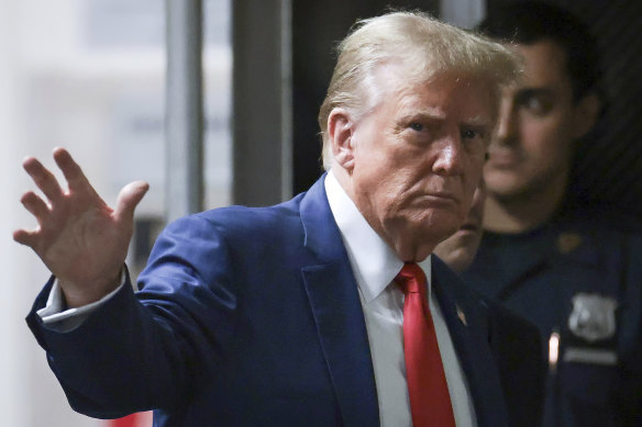 Former US president Donald Trump enter the Manhattan Criminal Court on Monday.