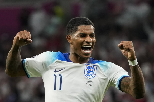 Marcus Rashford celebrates the second goal of his double against Wales.