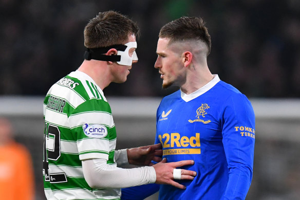 Celtic’s Callum McGregor and Ryan Kent of Rangers clash during last month’s derby in Glasgow.