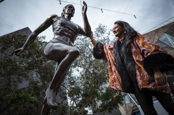Nova Peris unveils the new statue which immortalises her at Federation Square. 