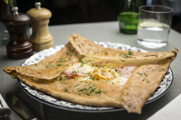 Buckwheat crepe with ham, cheese and egg.