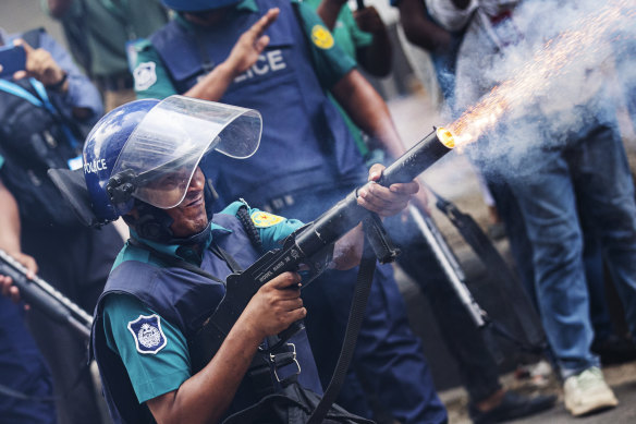 Police fire tear gas shells to disperse students in Dhaka, Bangladesh.