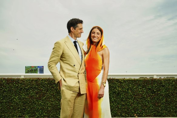 Television presenter Andy Lee in P Johnson and Rebecca Harding in Ferragamo.