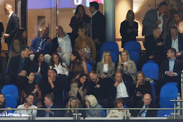 Perhaps Harry is explaining the finer points of rugby to American Meghan? 