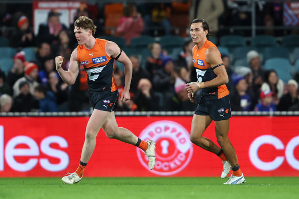 Now the Giants’ blue-chip midfielder, Tom Green celebrates a goal against the Western Bulldogs.