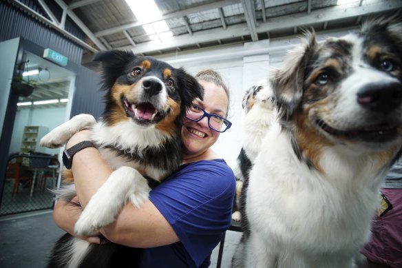 Katia Grimmer with her Australian shepherds, Freya and Missy.