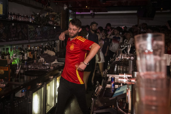 Scottish barman Scott Ferguson celebrates after Spain scored the winning goal in the Euro 2024 final against England.