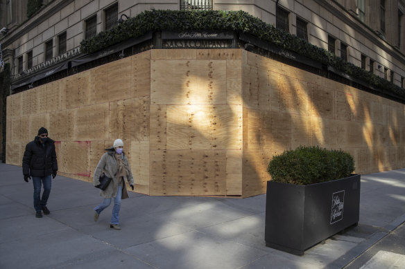 The boarded-up Saks Fifth Avenue shop in New York. 