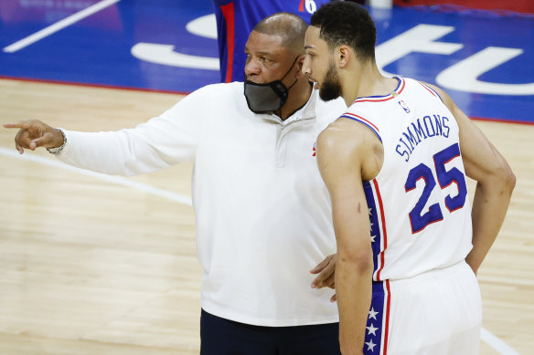 Sixers coach Doc Rivers speaks to Ben Simmons.