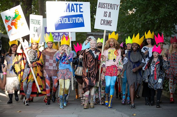 Vivienne Westwood (centre) and her ‘Fash Mob’ prior to her spring-summer show at London Fashion Week, 2015. 