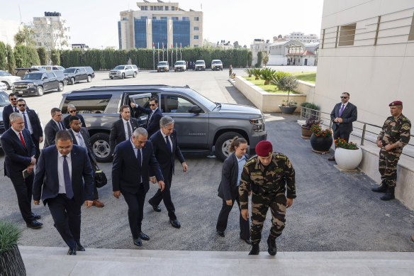 US Secretary of State Antony Blinken is greeted by PLO Secretary General Hussein al-Sheikh as he arrives to meet with Palestinian Authority President Mahmoud Abbas,