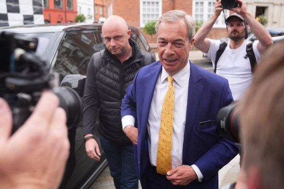 Reform UK leader Nigel Farage arrives at the fundraiser for Donald Trump.