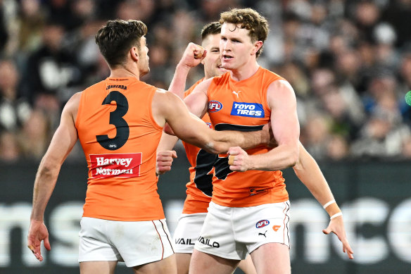 Tom Green of the Giants celebrates with Stephen Coniglio of the Giants.