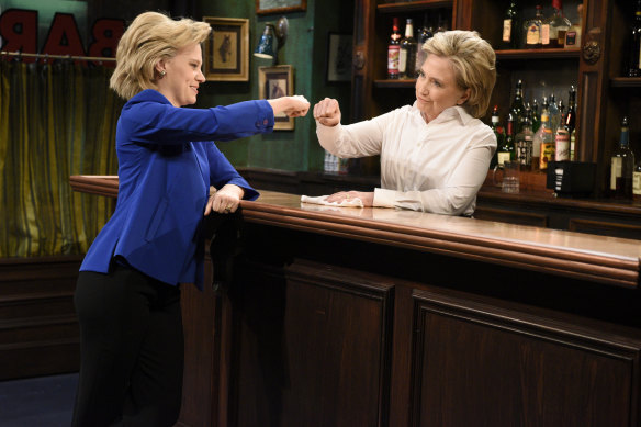 Kate McKinnon as Hillary Clinton and Hillary Clinton as Val in 2015.