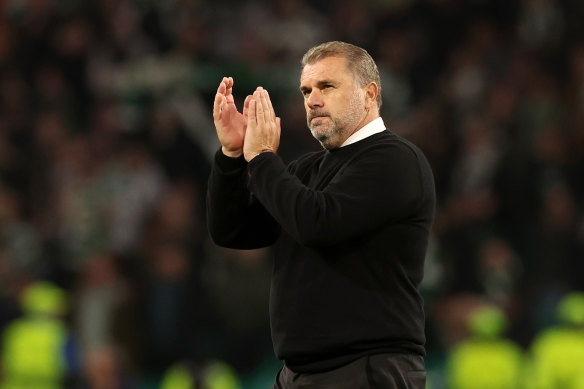 Postecoglou applauds the fans at Celtic Park following a 3-0 defeat by Real Madrid.