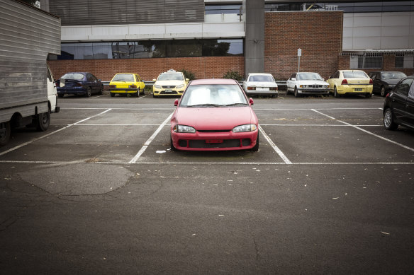 Abandoned cars at Northcote Plaza. Behind them is the Northcote police station.