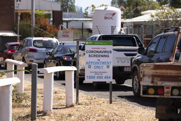 Cars line up for testing at the Katherine Hospital.