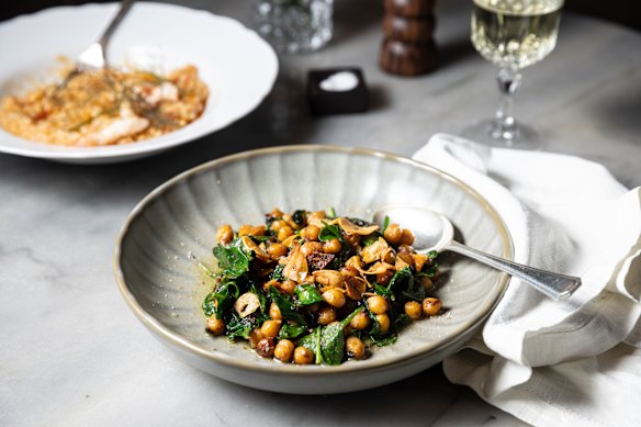 The signature spiced chickpeas and spinach (front), Portuguese prawn rice (top left) and a glass of sherry.