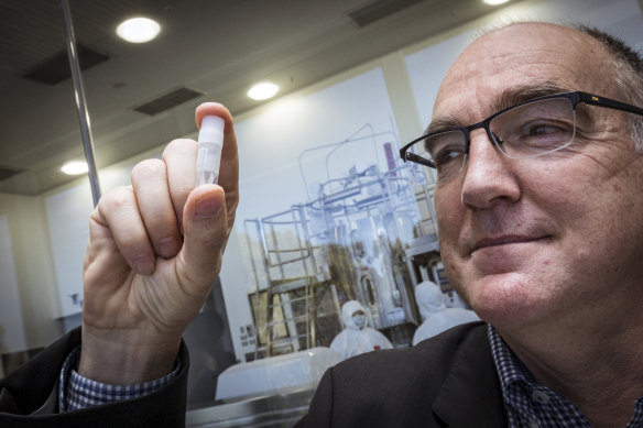 CSL chief scientific officer Andrew Nash with a replica vial of the vaccine.