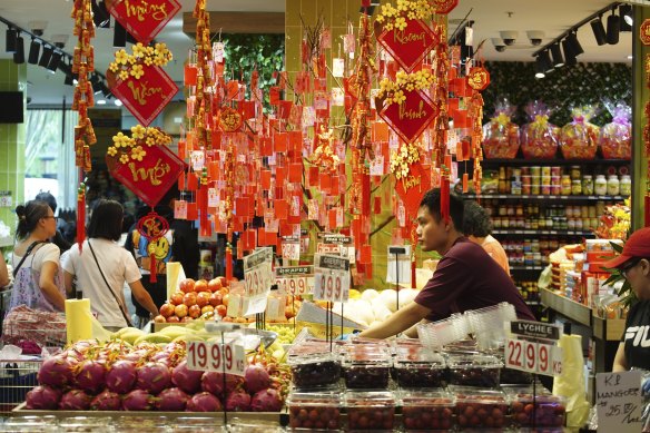 Lunar New Year decorations hang in the Springvale market. 