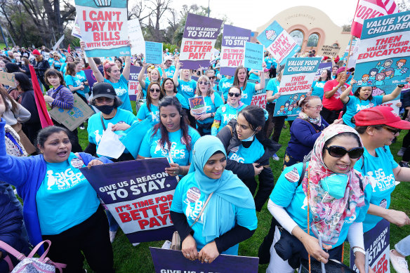 Childcare workers, shown protesting for better work conditions in Melbourne last year, are among the workers now  eligible for guaranteed sick and carer’s pay.