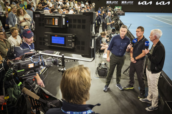 The commentary team records a live cross before the match.