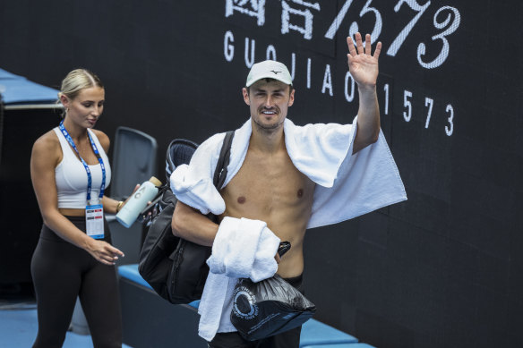 Bernard Tomic leaves the practice court at this year’s Australian Open.