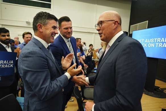Peter Dutton (right) with state Liberal leadership duo Brad Battin (left) and Sam Groth (centre).