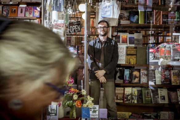 Ben Juers at The Paperback Bookshop, which has embraced late-night shopping every night of the week.
