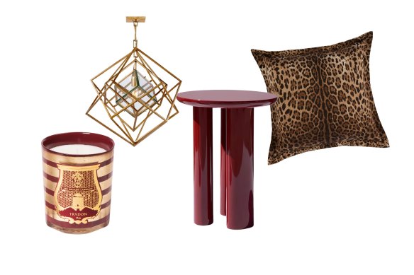 Balmain x Trudon candle; “Cubist” chandelier; “Callie” side table; Dolce and Gabbana cushion.