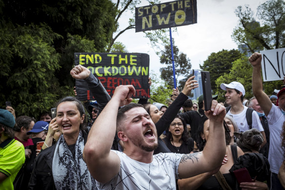 Protesters chanting in Melbourne on Friday.