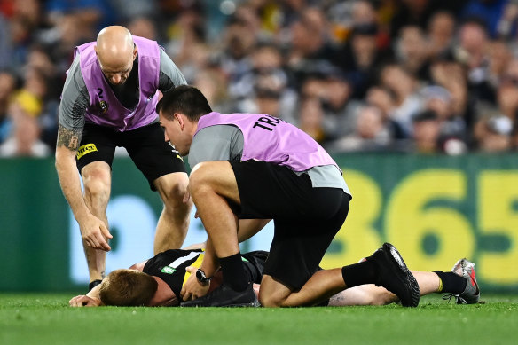 Nick Vlastuin was left concussed and took no further part in the grand final after a collision with Patrick Dangerfield.