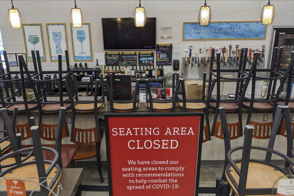 An indoors sitting bar is closed inside the Gelson's Market in Los Feliz neighbourhood of Los Angeles earlier in March.