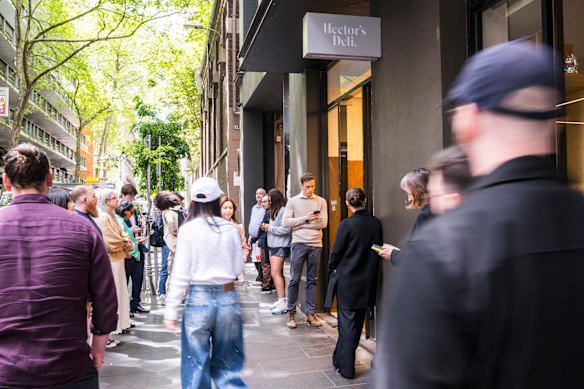Hector’s Deli draws a queue in Little Collins’ emerging hospitality hub.