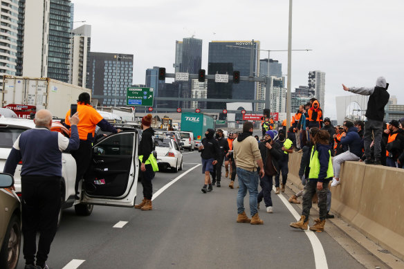 Protesters along the West Gate Freeway in Melbourne on Tuesday.