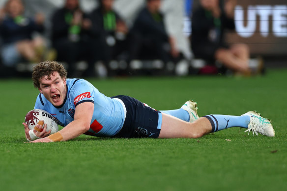 Liam Martin crosses for the Blues. 