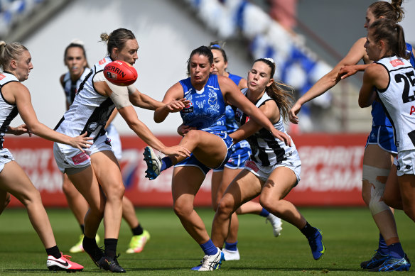 Ellie Gavalas of the Kangaroos gets a kick away.