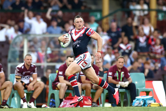 Brett Morris scored three tries in the Roosters’ hammering of the Sea Eagles.