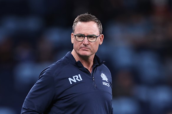 Waratahs coach Dan McKellar looks on. 