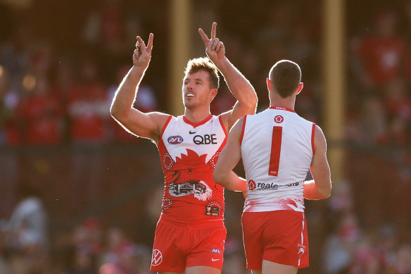 Luke Parker celebrates after kicking his 200th goal - his first on Saturday.