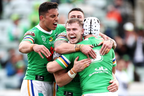 The Raiders celebrate a try from Hudson Young which helped keep their top-four hopes alive.