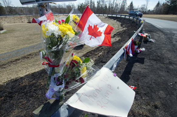 A memorial pays tribute to Royal Canadian Mounted Police Constable Heidi Stevenson killed in Sunday's mass shooting in Shubenacadie, Nova Scotia.