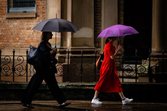 Umbrellas came out of storage on Friday morning.