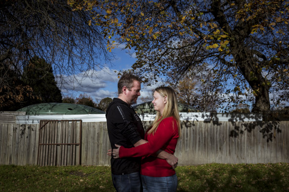 Matt McMahon and Kassey Eldridge in their backyard, where they had prepared to marry if restrictions remained tight.