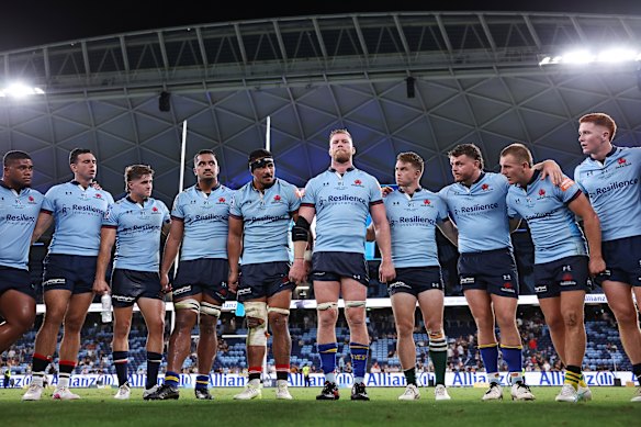 The Waratahs take a minute after their heavy defeat to the Hurricanes.