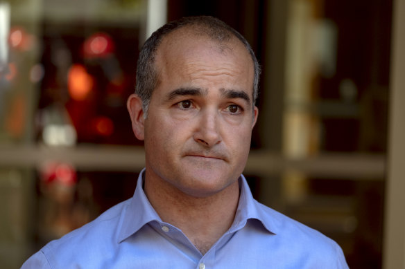 Education Minister James Merlino said students who feel well should go to school, even if they had visited China. 